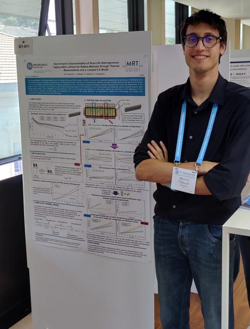 Martino Fortunati presents his research poster at the 37th ISE Topical Meeting in Stresa, Italy